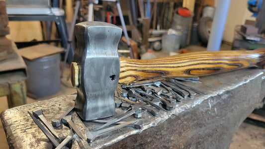 Rounding hammer made from horseshoe nails